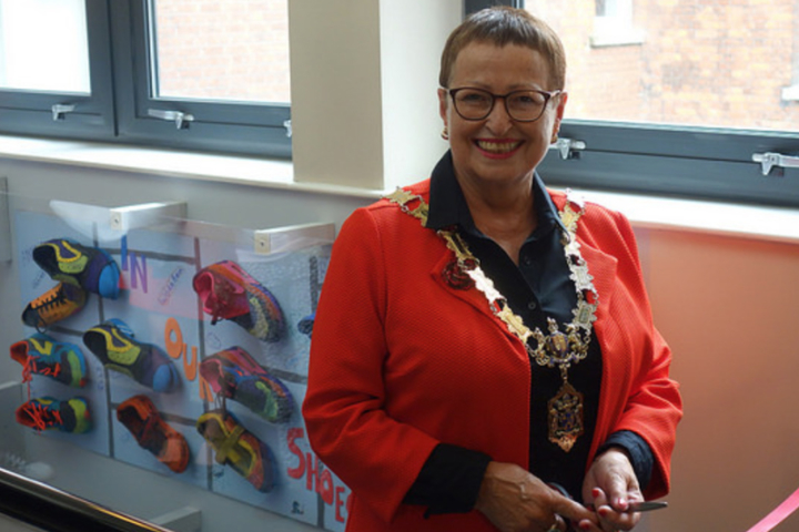 Reading Mayor Cllr Deborah Edwards with In our Shoes artwork