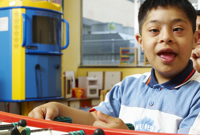Child playing table football