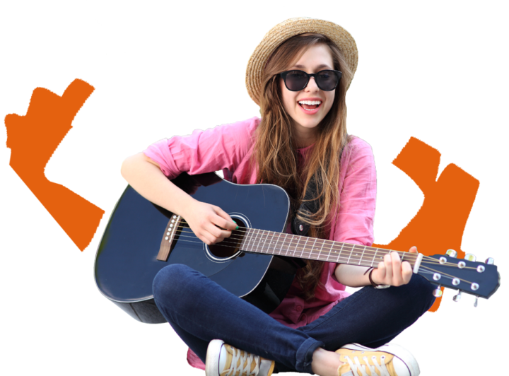 Happy girl playing guitar with sunglasses on