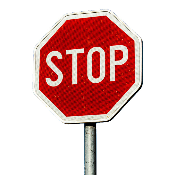 Red road sign saying stop