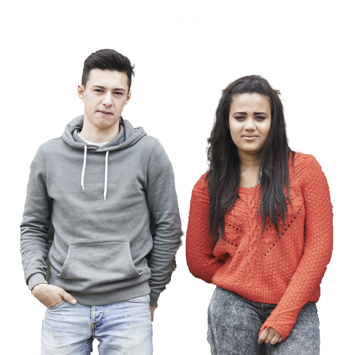 Male and female teenager looking at camera