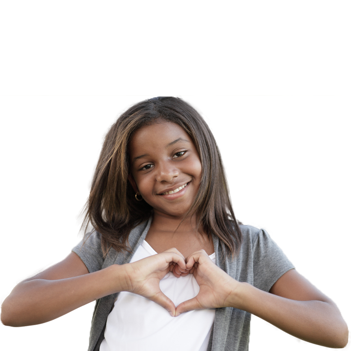 Girl making heart shape with her hands
